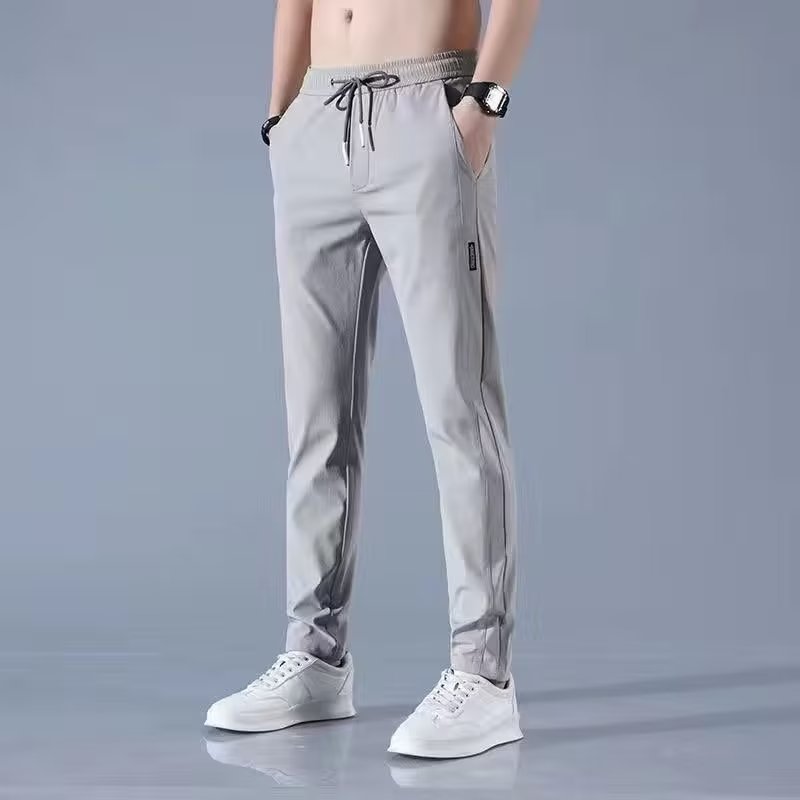 Men's ice-silk trousers summer thin casual pants mint cold sense suit pants young breathable sagging trousers man